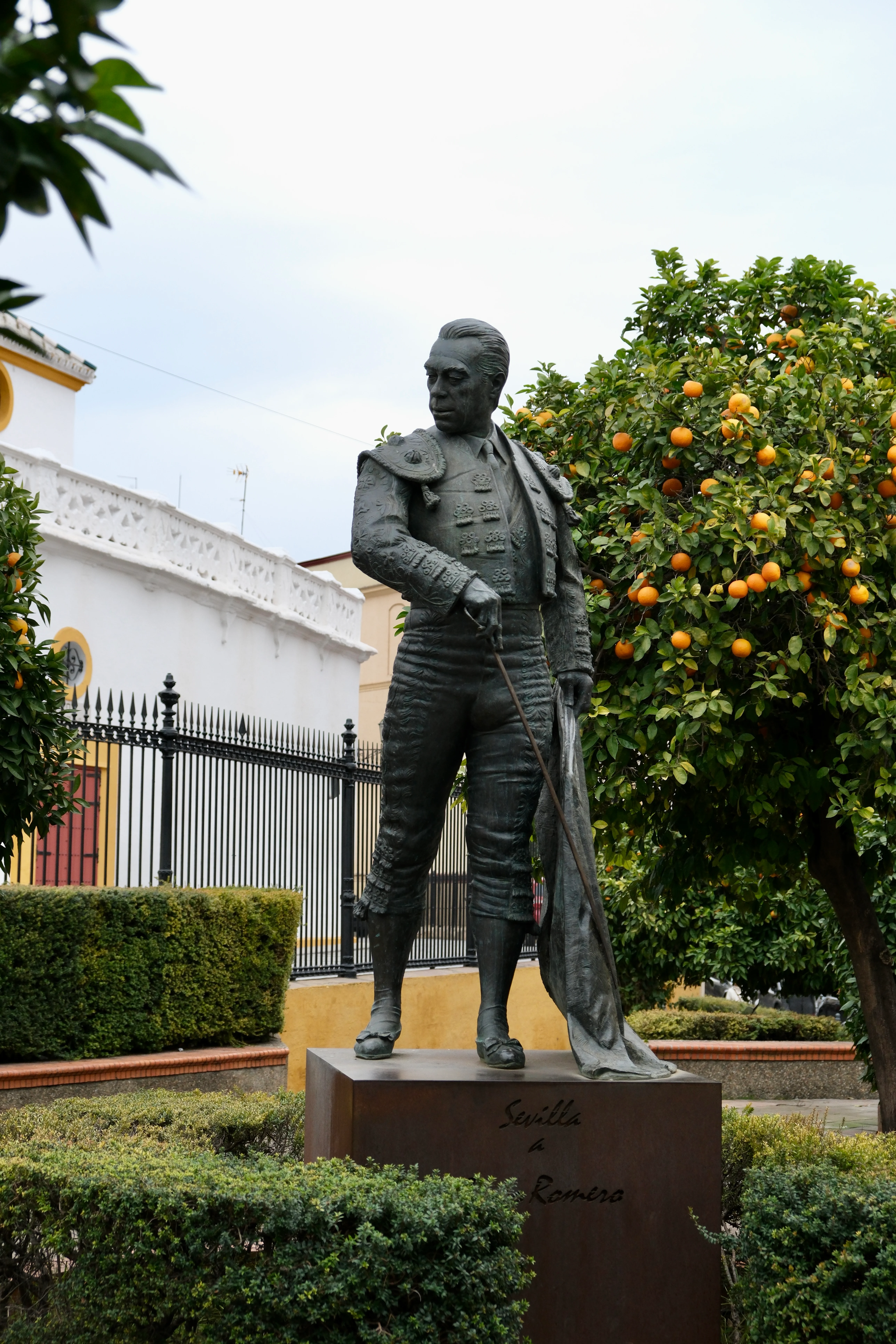 39mm · f/4.5 · 1/1000s · ISO 800
FUJIFILM X-T5 · XF18-55mmF2.8-4 R LM OIS · Dec 29, 2023
Bronze bullfighter statue near orange trees in Seville, Spain.
Seville, Spain
© Brandon Cook
