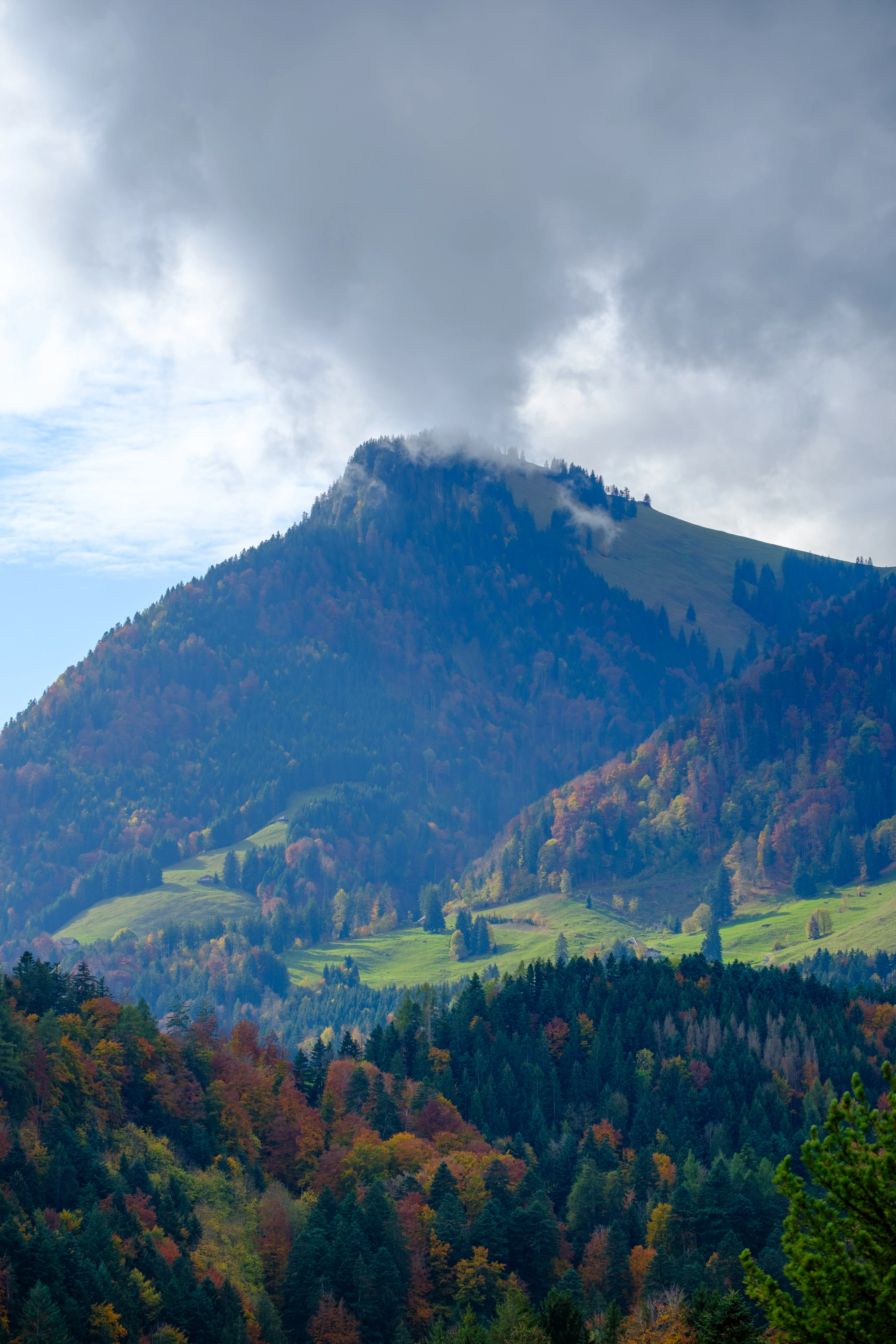 70mm · f/4 · 1/1250s · ISO 125
FUJIFILM X-T5 · XF70-300mmF4-5.6 R LM OIS WR · Oct 22, 2024
Misty autumn mountain peak and colorful forests in Gruyères, Switzerland.
Gruyères, Switzerland
© Brandon Cook