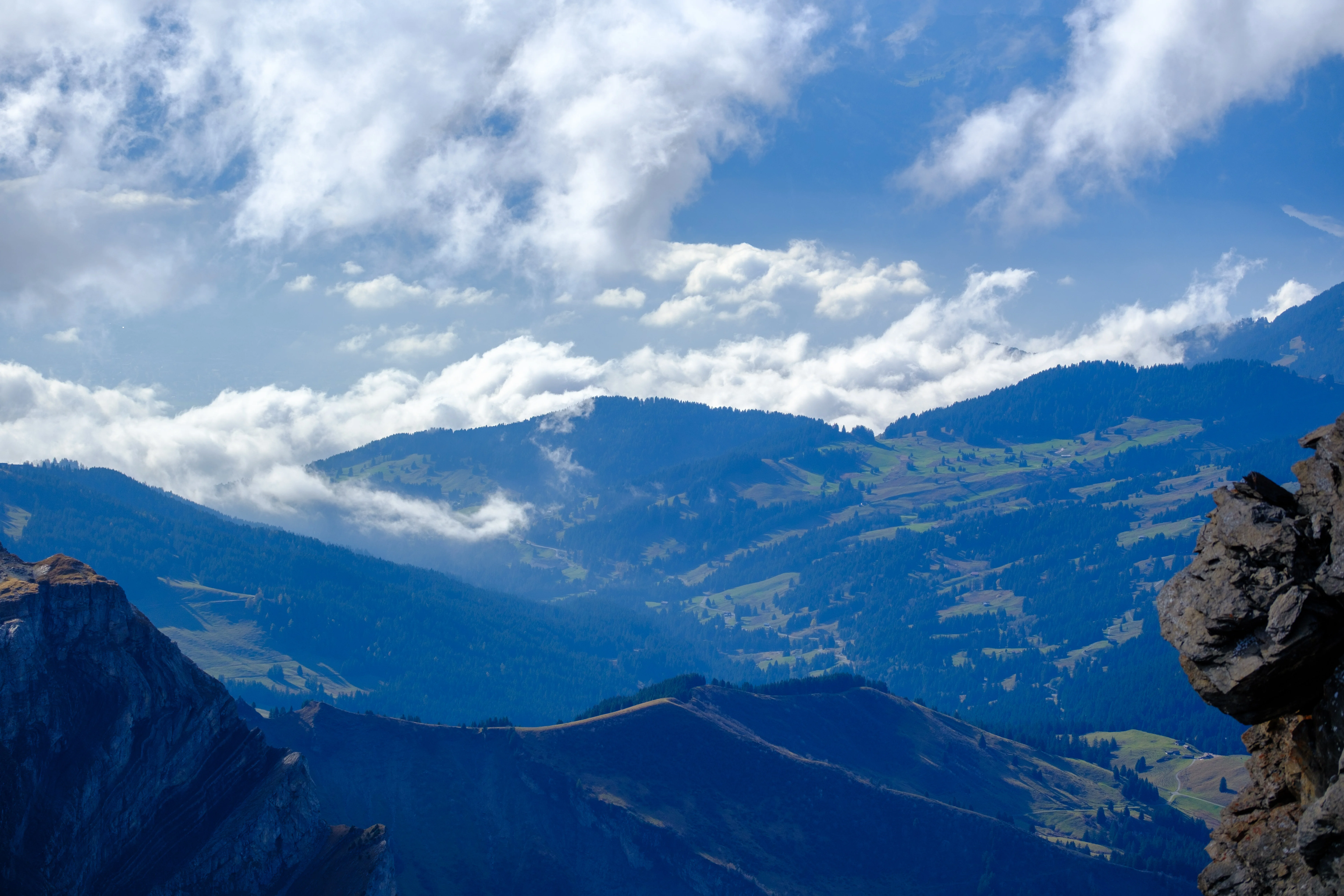 70mm · f/4 · 1/1600s · ISO 125
FUJIFILM X-T5 · XF70-300mmF4-5.6 R LM OIS WR · Oct 24, 2024
Rolling Swiss mountains under white clouds in Saanen, Switzerland.
Saanen, Switzerland
© Brandon Cook