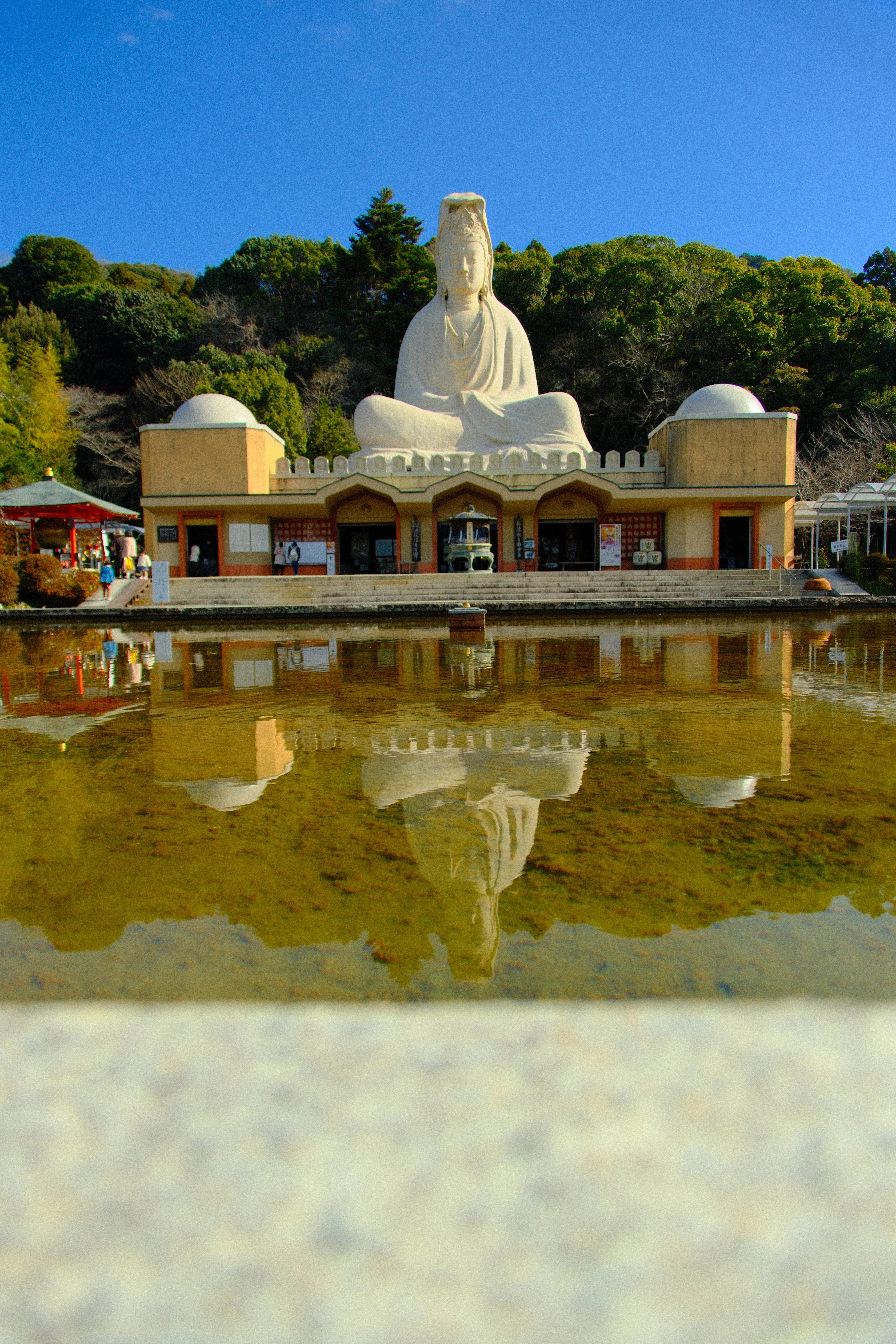 16mm · f/3.5 · 1/3200s · ISO 500
FUJIFILM X-T5 · 16-300mm F3.5-6.7 DC OS | Contemporary 025 · Jan 10, 2026
White Kannon statue reflected in still water, Kyoto, Japan.
Kyoto, Japan
© Brandon Cook