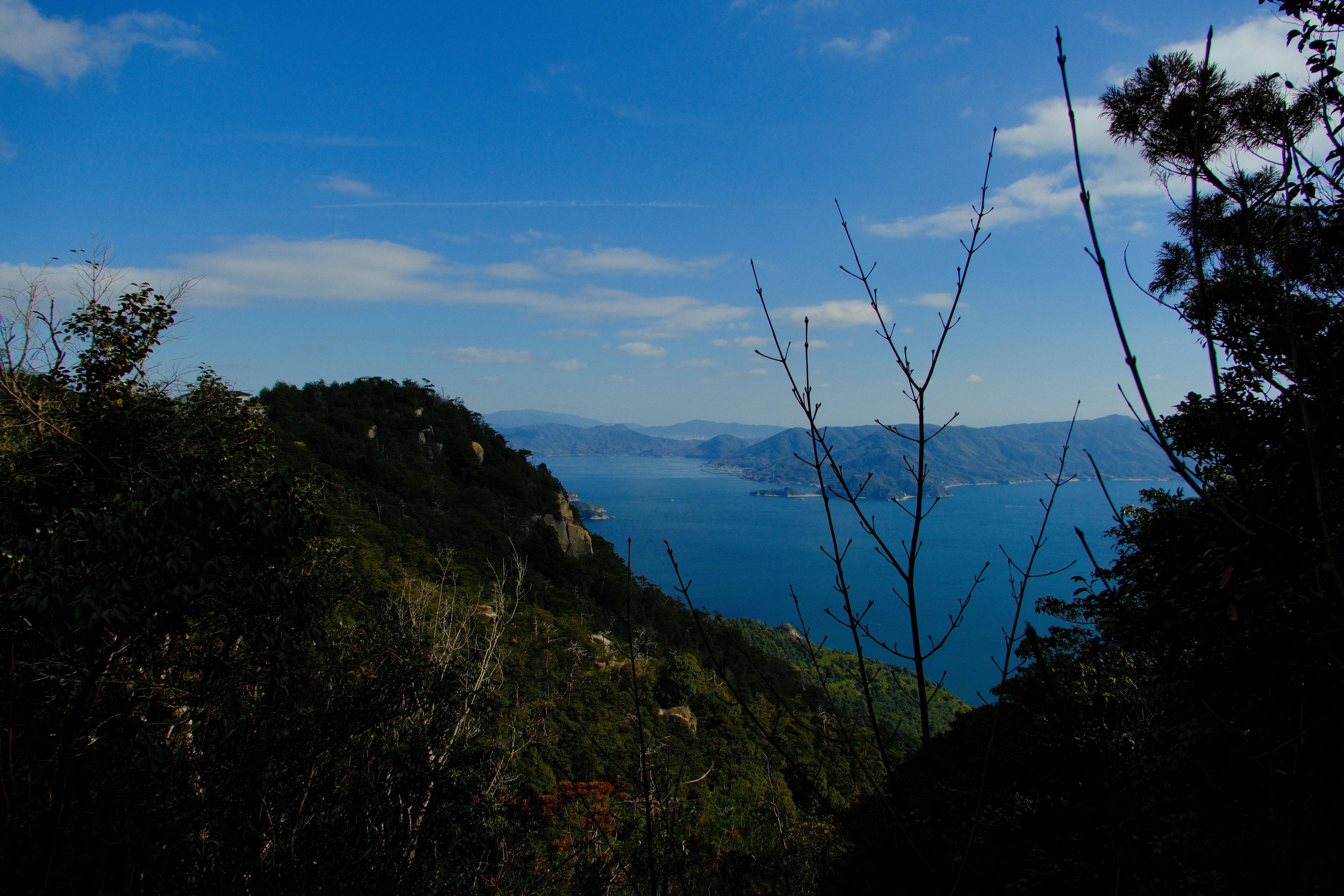 16mm · f/8 · 1/1700s · ISO 500
FUJIFILM X-T5 · 16-300mm F3.5-6.7 DC OS | Contemporary 025 · Jan 12, 2026
Scenic mountain vista overlooking the blue sea and distant islands.
Miyajima, Japan
© Brandon Cook