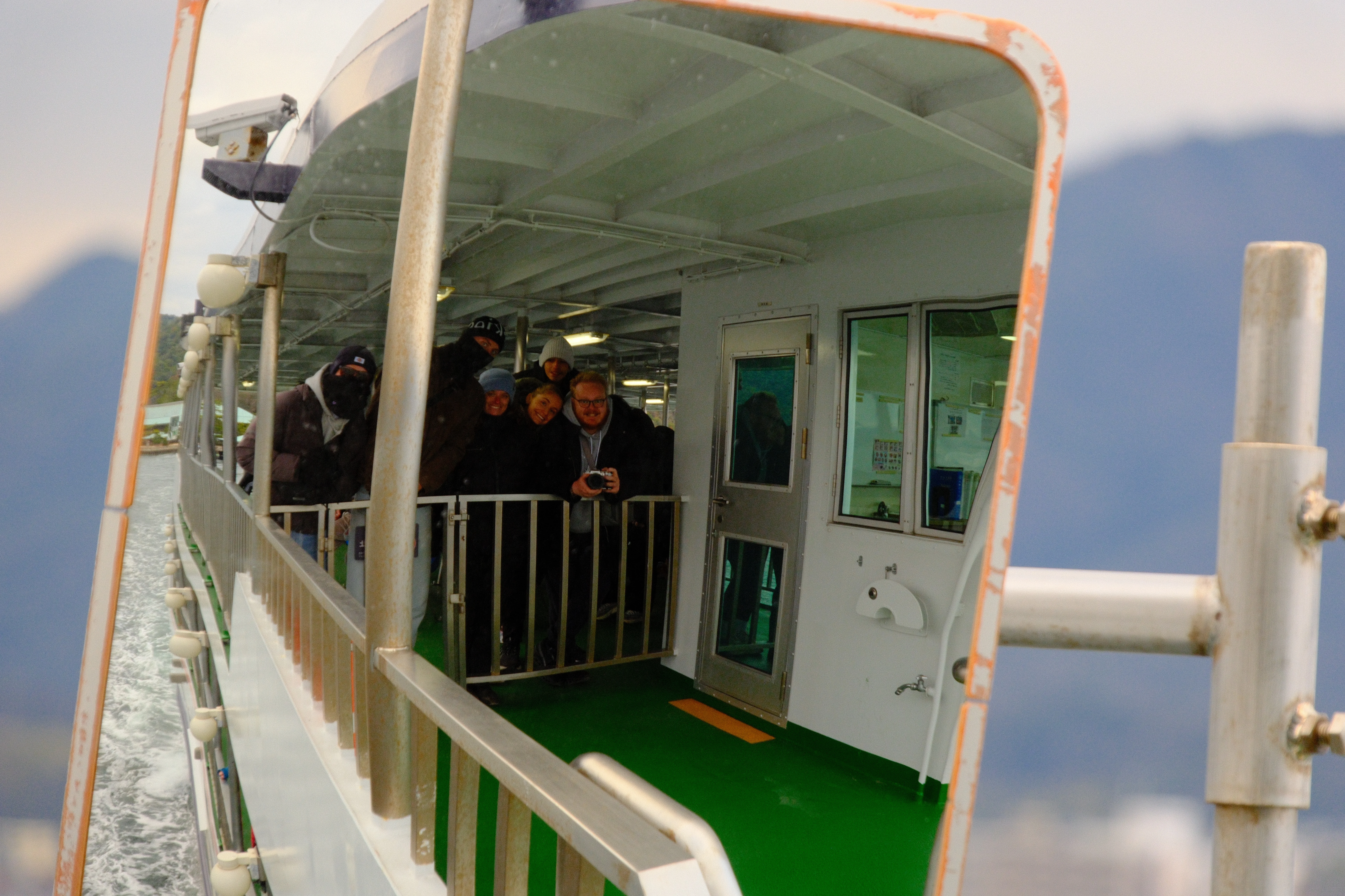 156mm · f/8 · 1/125s · ISO 1000
FUJIFILM X-T5 · 16-300mm F3.5-6.7 DC OS | Contemporary 025 · Jan 12, 2026
Reflection of people on a ferry in Miyajima, Japan.
Miyajima, Japan
© Brandon Cook