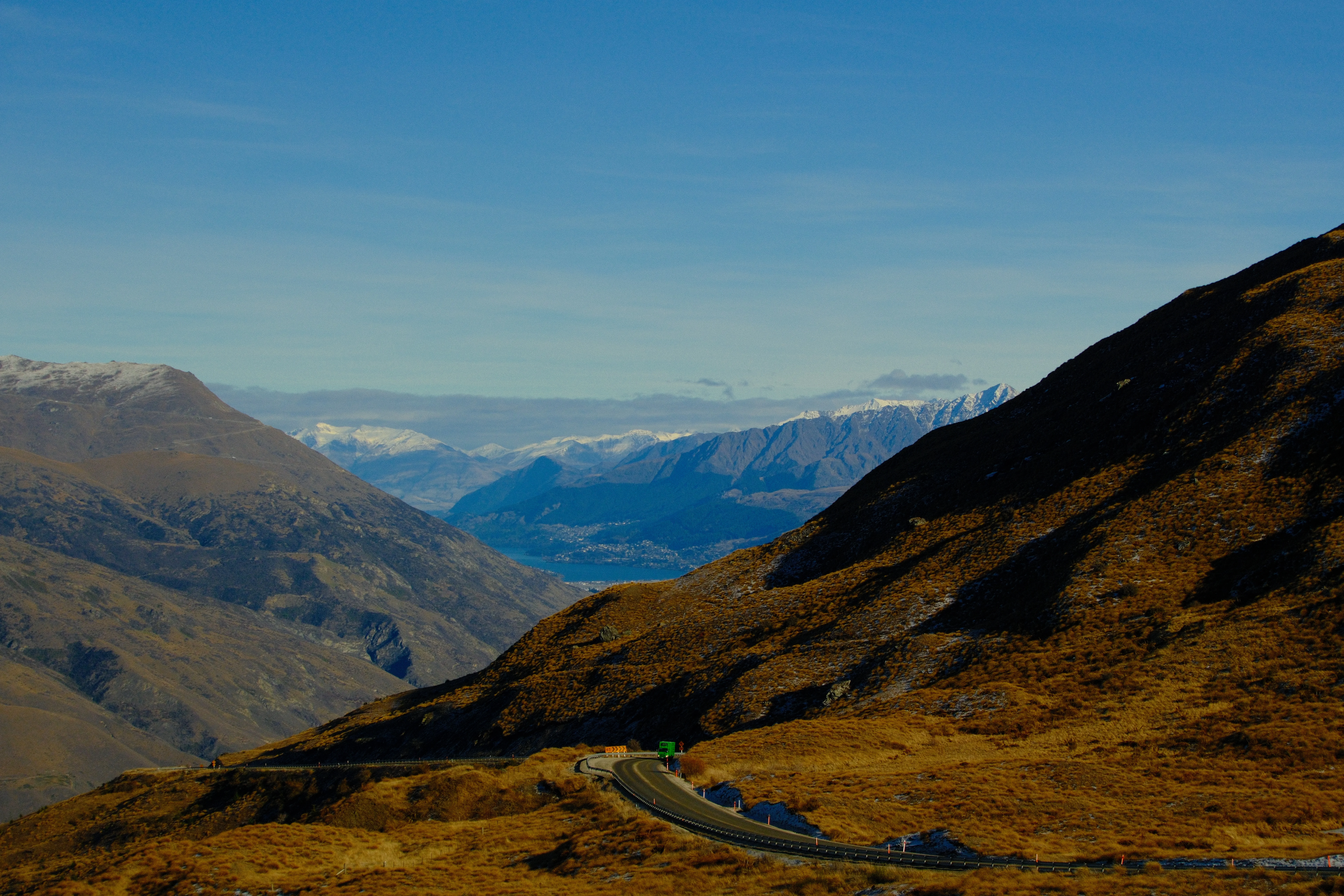 48mm · f/6.3 · 1/2200s · ISO 500
FUJIFILM X-T5 · 16-300mm F3.5-6.7 DC OS | Contemporary 025 · Jul 28, 2026
Mountain road winding through hills toward a distant lake.
Crown Range, New Zealand
© Brandon Cook