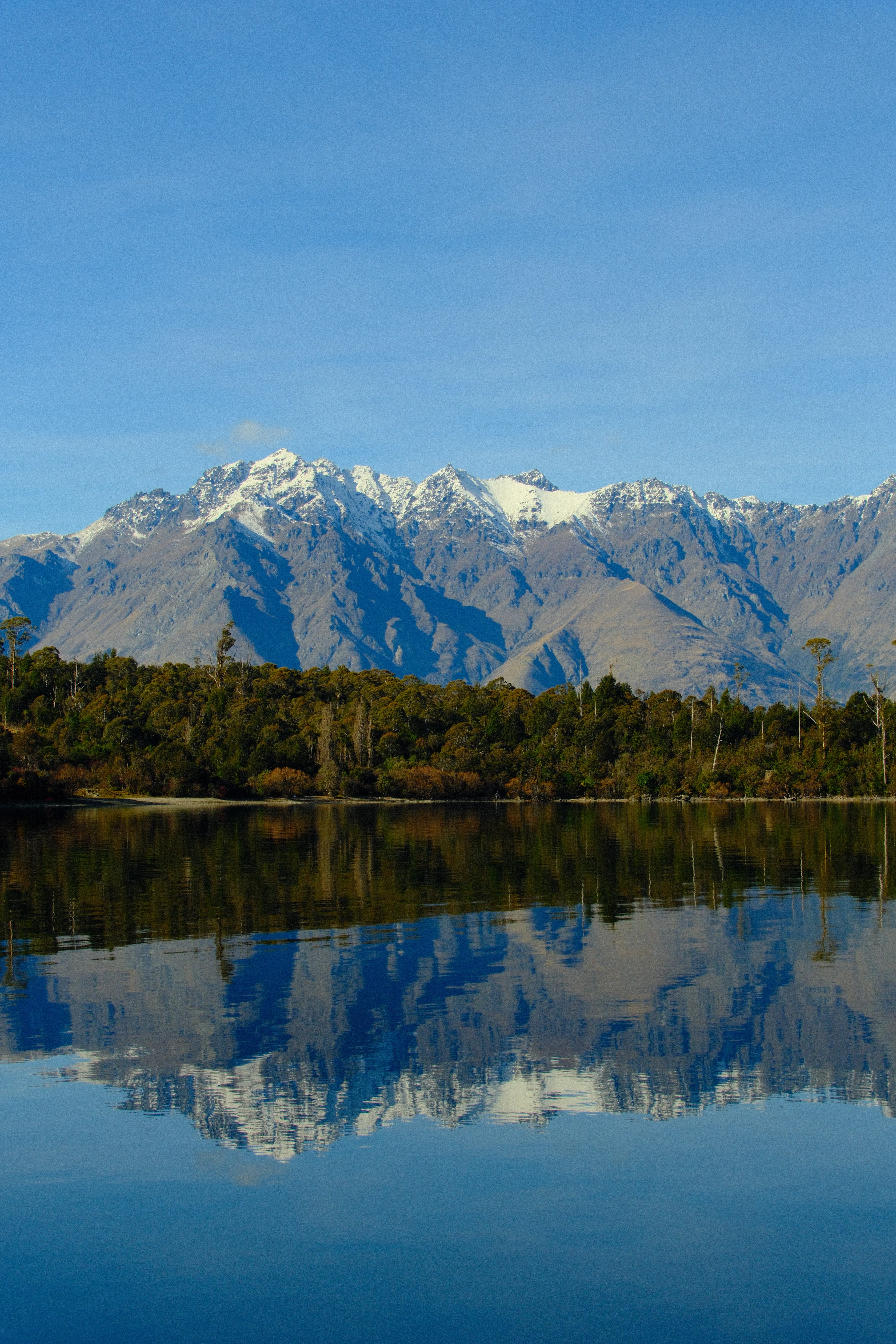 37mm · f/6.3 · 1/1000s · ISO 500
FUJIFILM X-T5 · 16-300mm F3.5-6.7 DC OS | Contemporary 025 · Jul 28, 2026
Upside-down photo of mountains reflecting in water in New Zealand.
Bob's Cove, New Zealand
© Brandon Cook